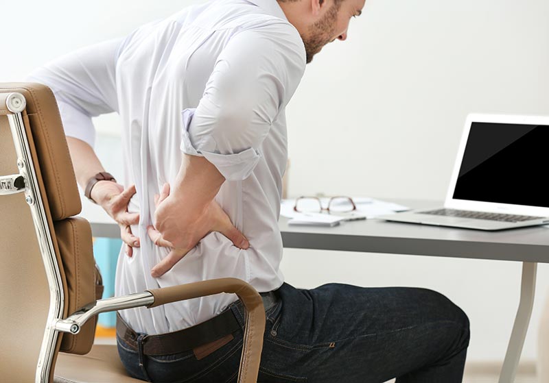 Avoid back pain with a sit-stand desk